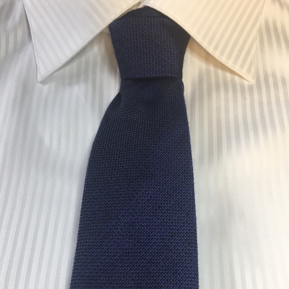 Calvin Klein blue with black weave silk and viscose tie. Like New